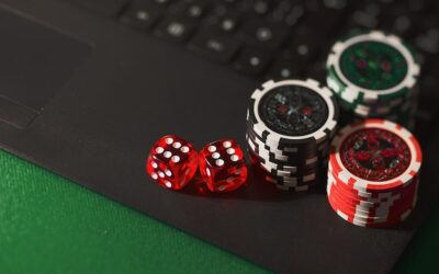 Dices, casino chips on the notebook