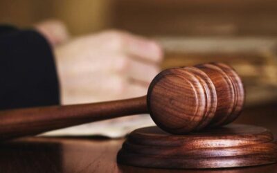 Woman hands, hammer in court
