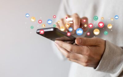 Phone in hands and icons