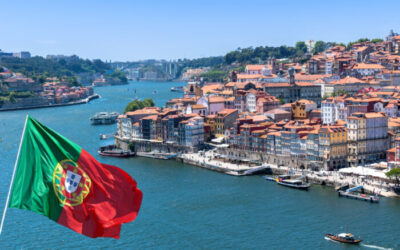 Flag of Portugal and a City behind it